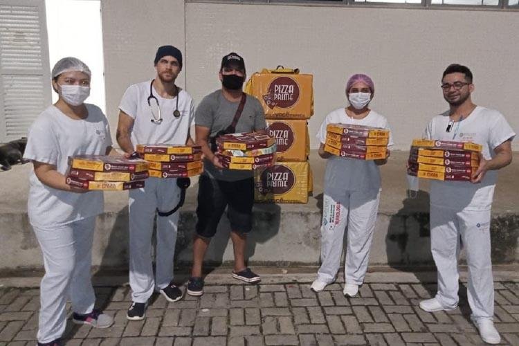 Pizzaria doa 1000 pizzas para profissionais da saúde em Macapá